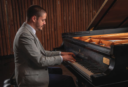 UA piano student Philip Anderson practices on a Steinway.