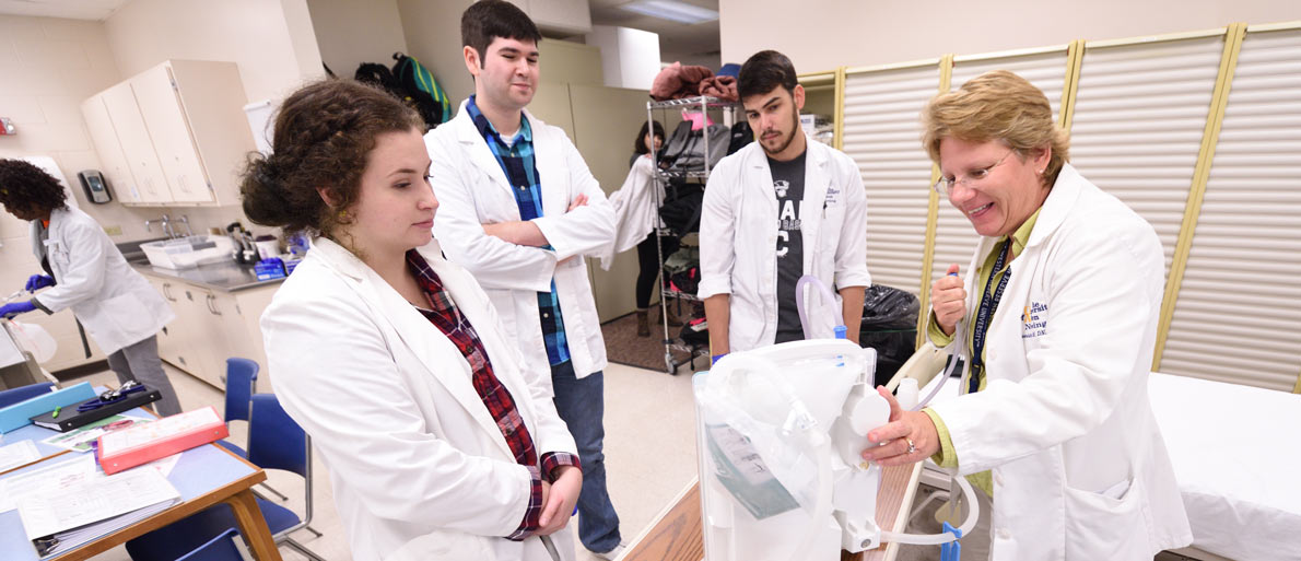 Nursing students in a lab at The University of Akron