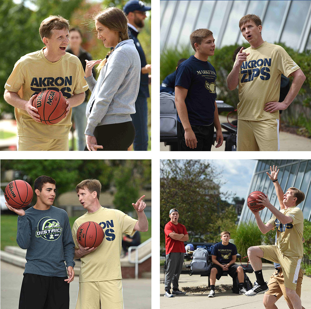 President Wilson shoots basketball with students outside of the Student Union