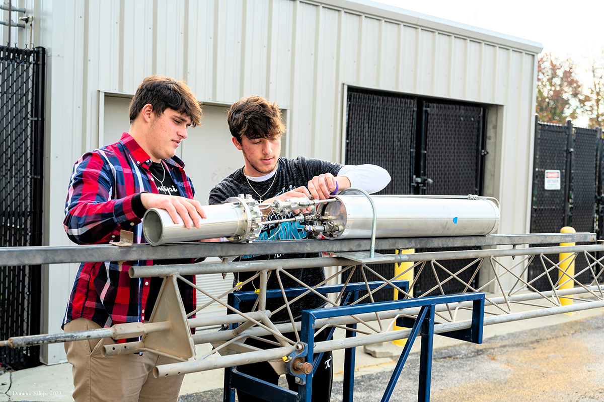 Brothers, Trevor and Reece Davis working on the VLV test article.