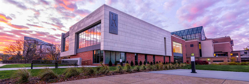 Exterior of the business building at sunrise