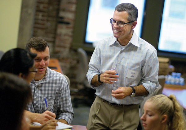 Students in the MBA program at Akron work on a project