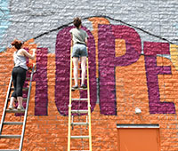 Students work together on an art project