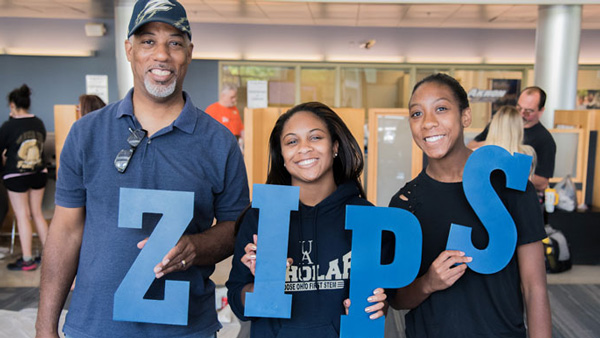Family of a UA college student and family at an on-campus event