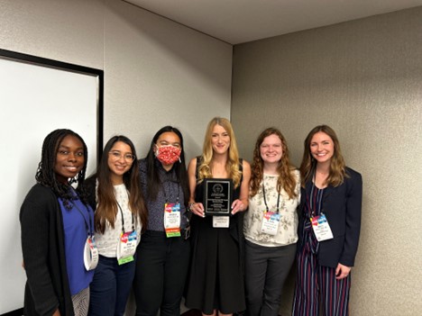 Dr. Margo Gregor,associate professor in psychology, along with several graduate students accepted the award at the conference.