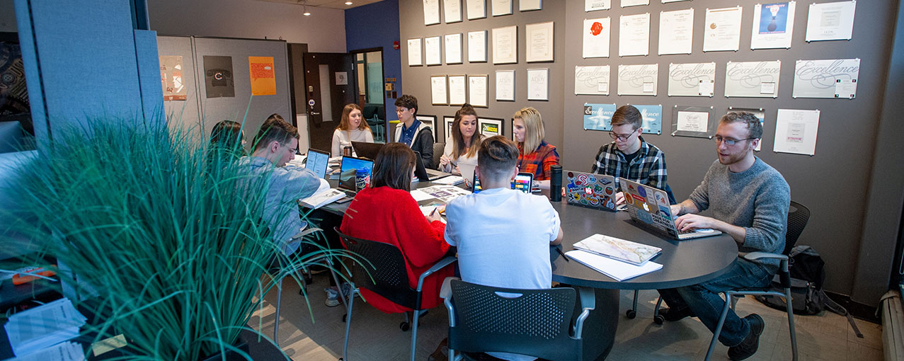 Students of the College of Business in a Student Organization meeting