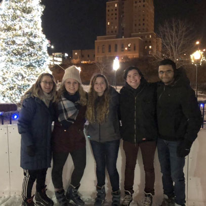 Students enjoying ice skating in downtown akron for new years eve