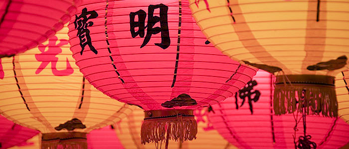 Brightly colored Chinese lanterns brighten a room