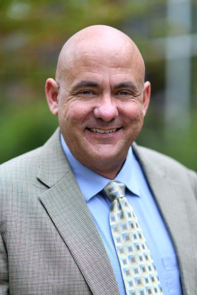 Headshot of Dr. Eric Brisker