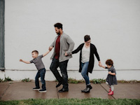 picture-of-a-family (photo by Emma Bauso: https://www.pexels.com/photo/family-of-four-walking-at-the-street-2253879/)