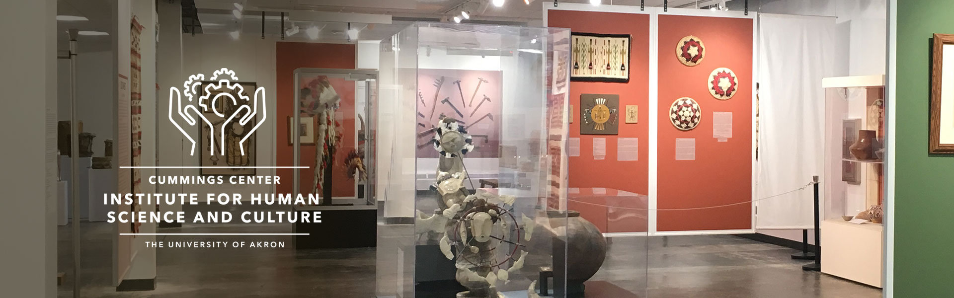 Institute for Human Science and Culture logo displayed over a gallery of Native American artifacts