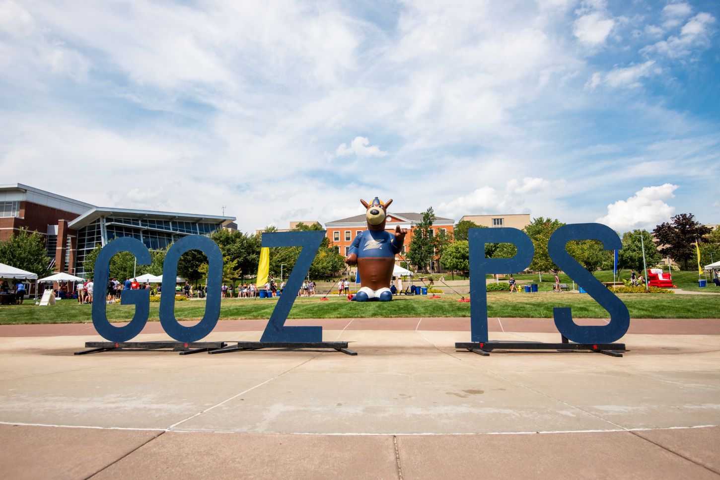 Large, freestanding blue letters spell out 