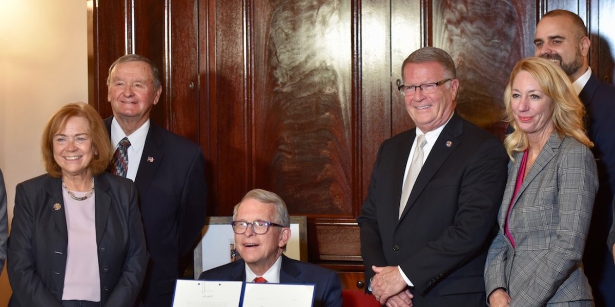 Govenor Dewine signing into bill required financial literacy for high schoolers