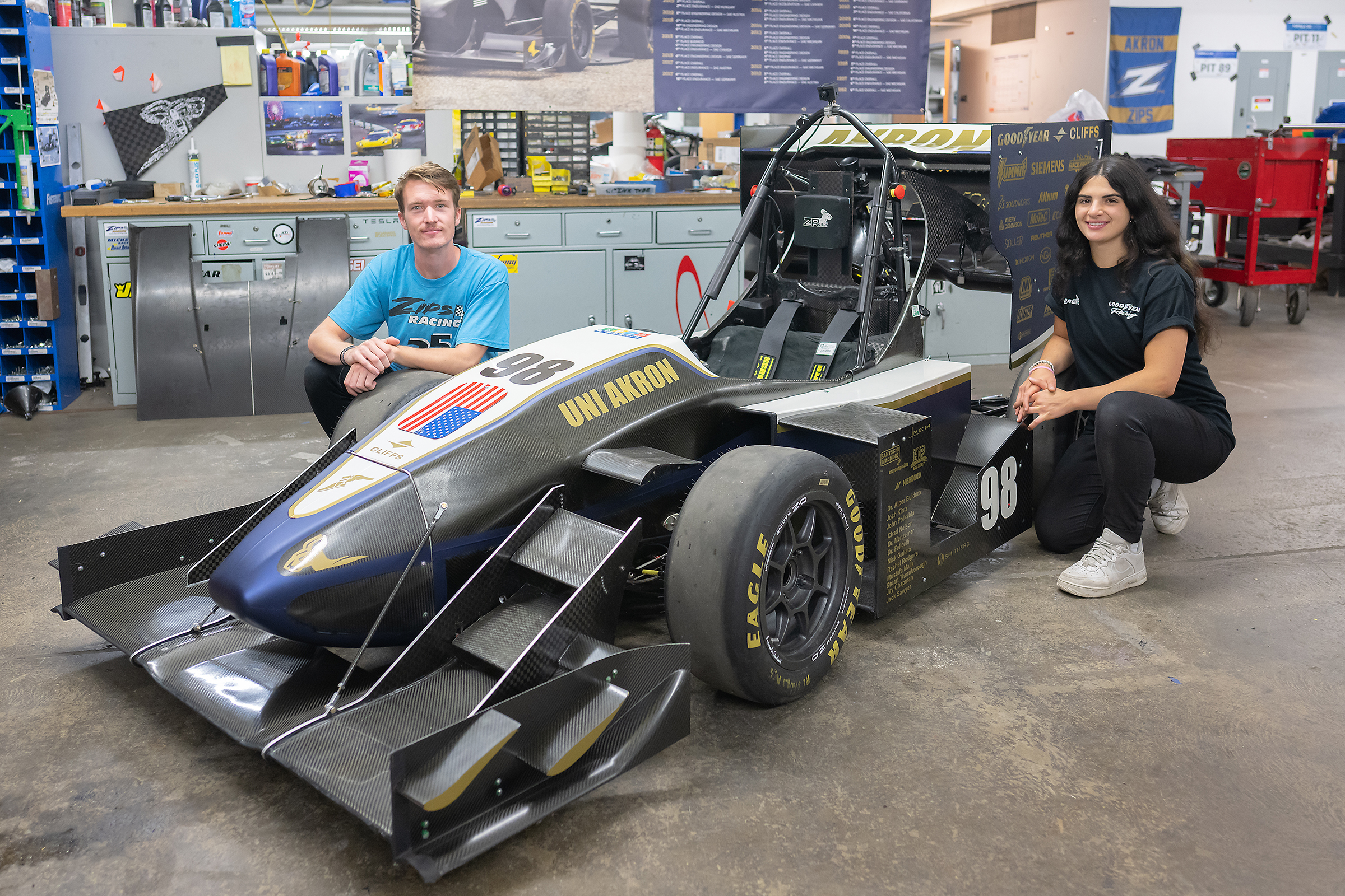 Unveiling the Future: Ray Hilbert, Zips Racing team captain, and Gianna Buzzelli, incoming team captain, alongside ZR22, aka 