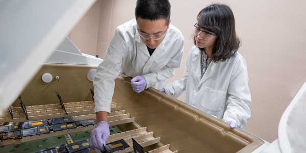Chemical and Biomolecular Engineering students working in the lab at The University of Akron