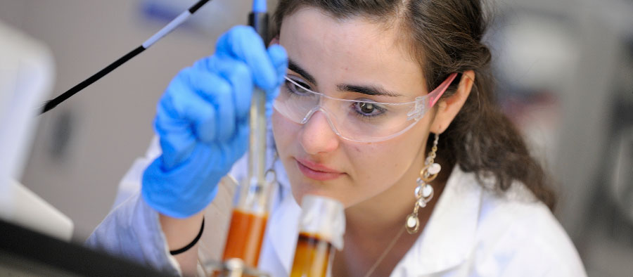 Chemical Engineering Graduate student working in the research lab at The University of Akron