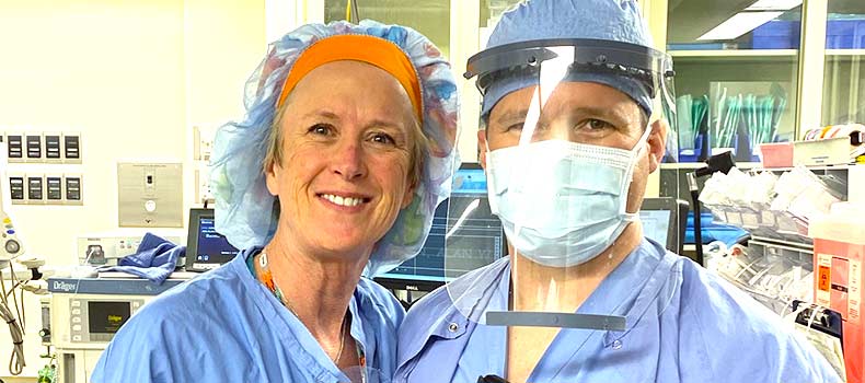 A nurse wearing a face shield developed and manufactured by College of Engineering students and faculty members, along with other partners