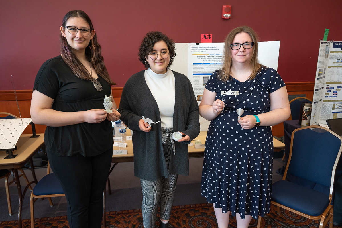 First Place - Research Design Projects: Recycling Plastic Bottles Into 3D Printing Filament. Pictured left to right are team members Megan Arcena, Melissa Cardew and Alexis Jordan.