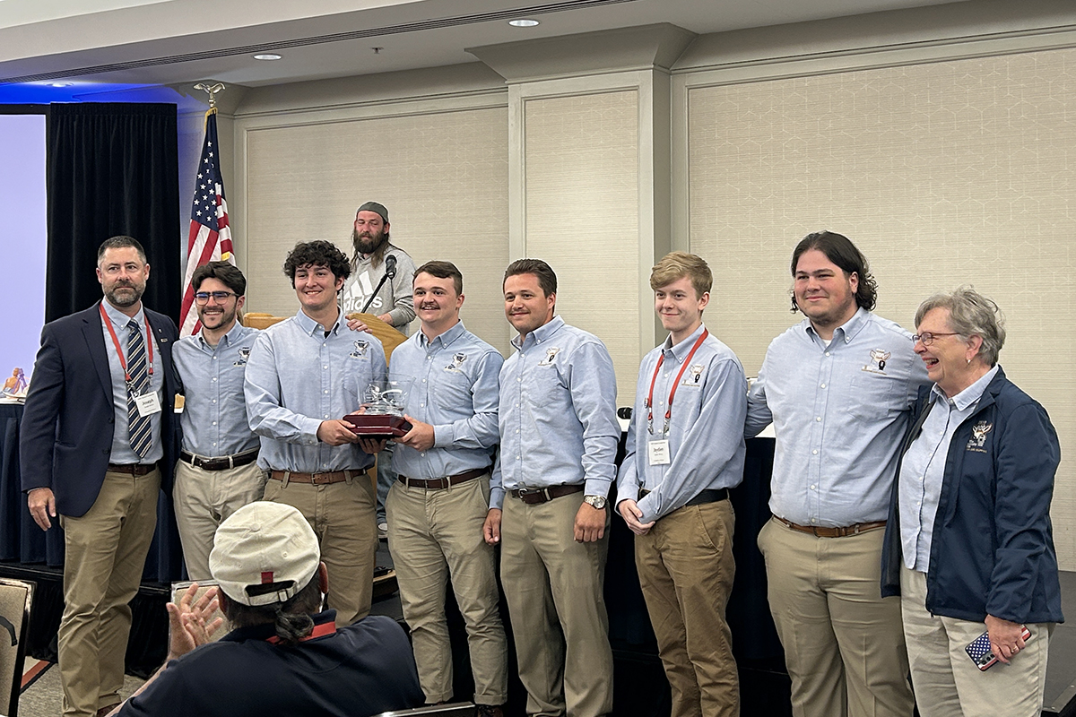 UA's team accepting the Mike and Ann Besch Award for first place at the 23rd Annual National Society of Professional Surveyors Student Competition.