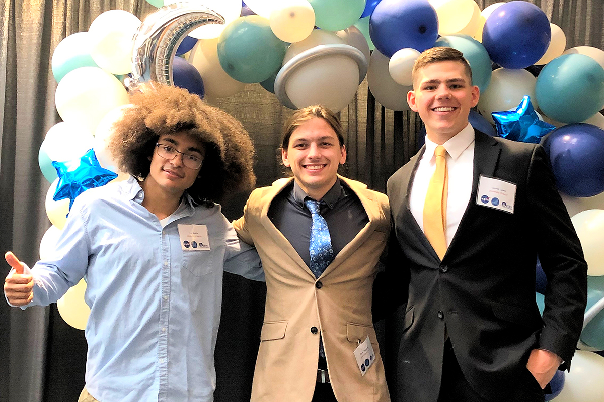 Pictured left to right are engineering students Lee James Nestor, Ryan Dippolito and James Lyons at the OSGC Annual Student Research Symposium.