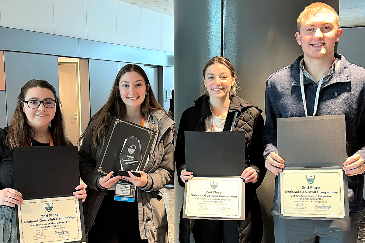 Pictured left to right: Geo-Wall members Caley Barnett, Jesse Pennington, Naomi Wertz and Benjamin Noirot holding their second place awards.