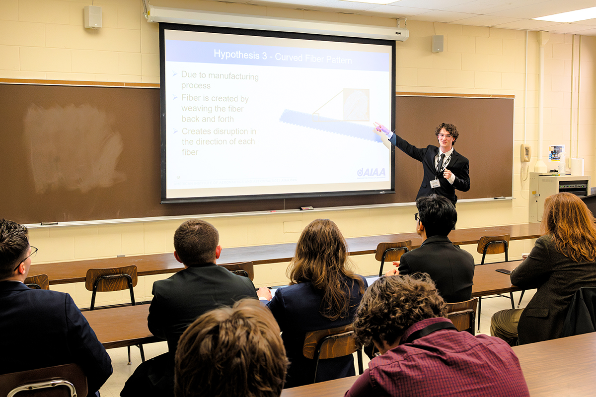 UA students presenting their research in the Undergraduate category.