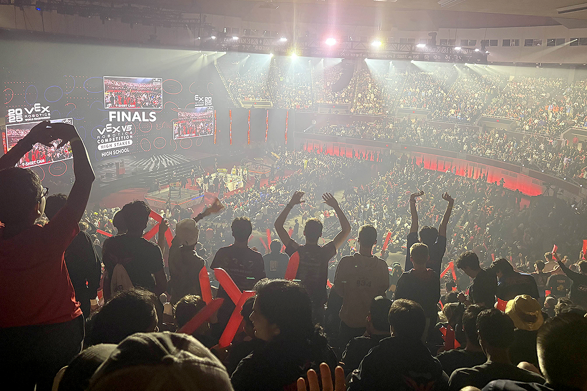 Phalanx Robotics team members watch the final ceremonies as top teams compete for the world championship title.