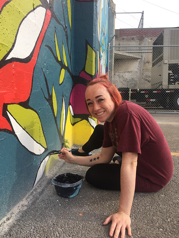 Brigade member paints Brigade member paints
