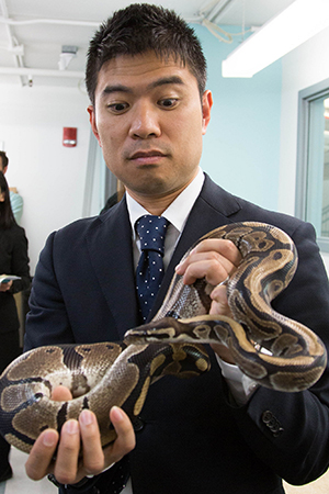 Japanese visitor with snake