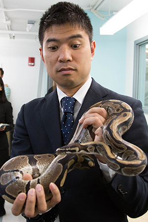 Japanese visitor with snake Japanese visitor with snake