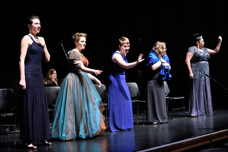 Opera singers performing on stage