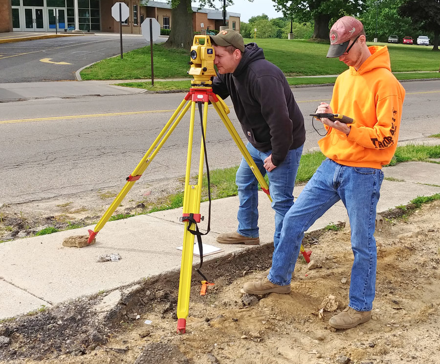 University of Akron surveying and mapping students on site