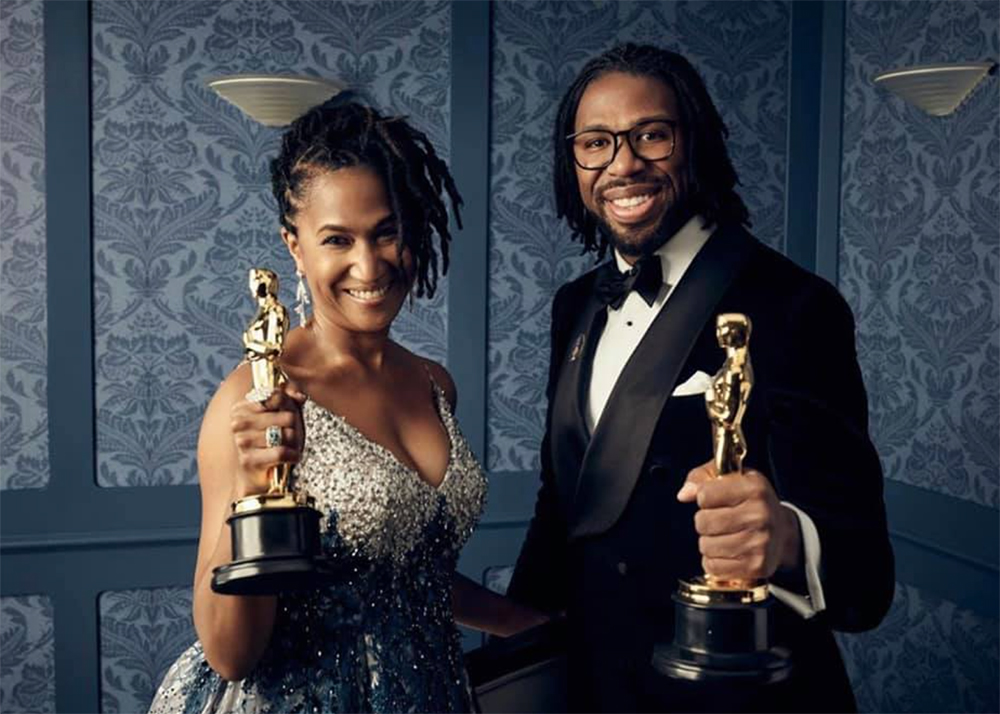 Karen Toliver and Matt Cherry holding Oscars