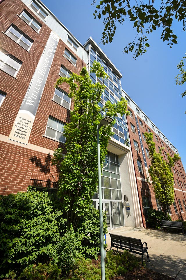 The exterior of the Honors Complex, looking up