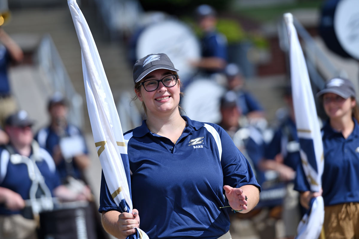 Members of the marching band perform