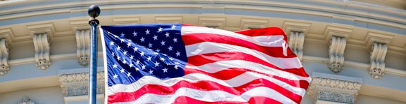 The American flag before the U.S. Capitol