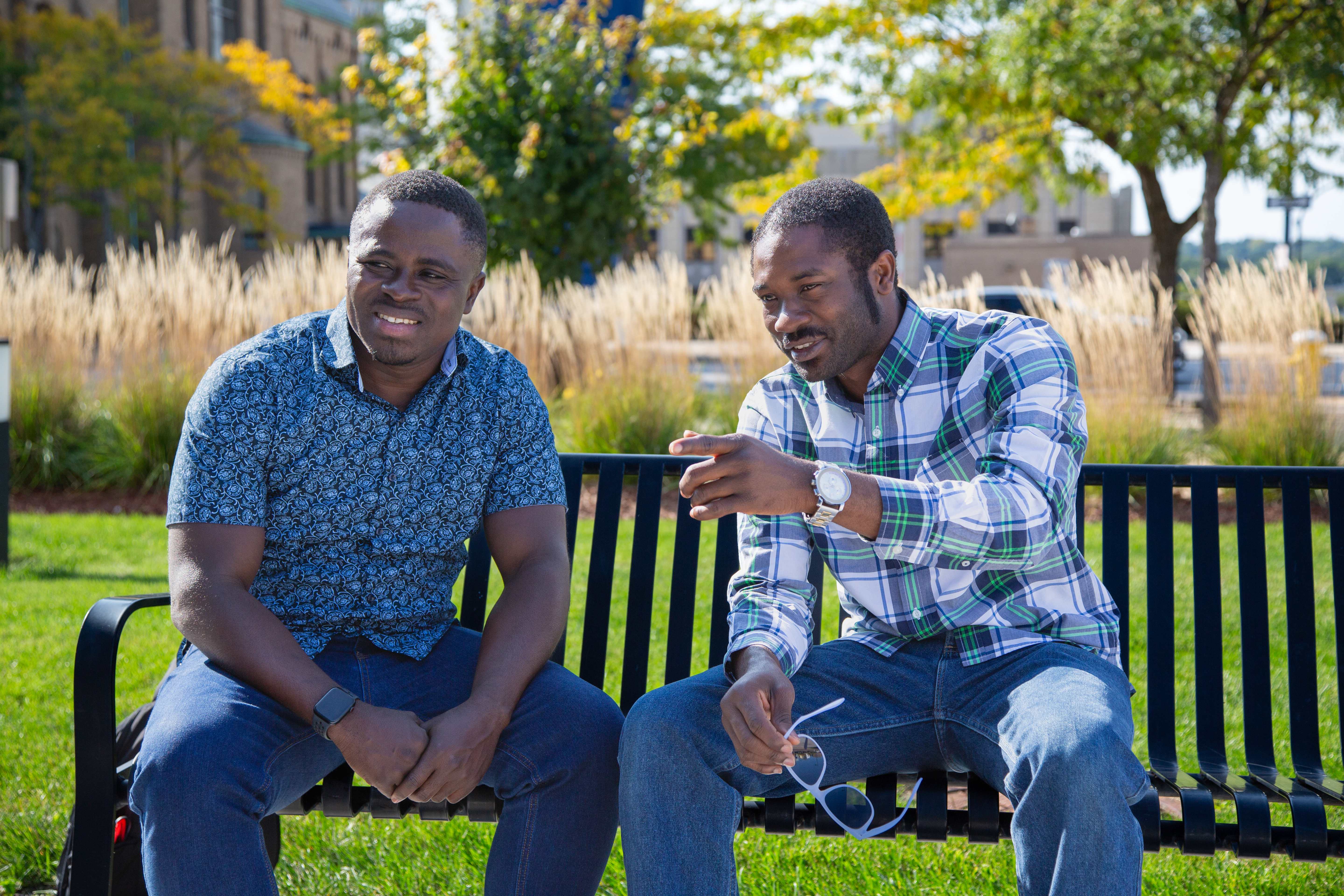 UA students in class interacting with one another