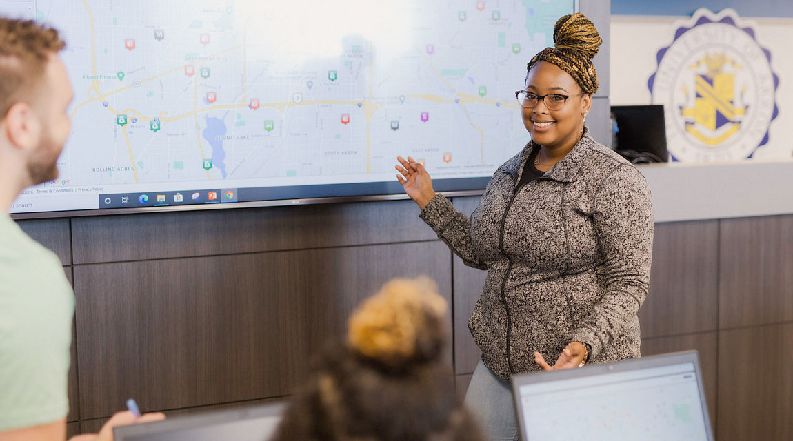 A Strategic Communication student giving a presentation.