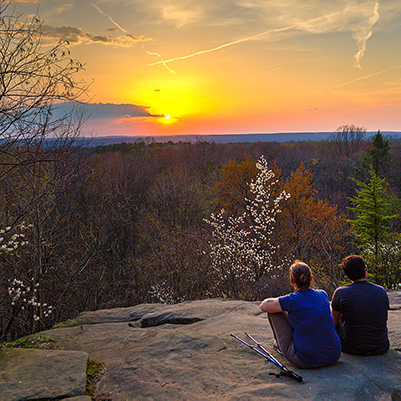 People enjoying Ledges Overlook at sunset
