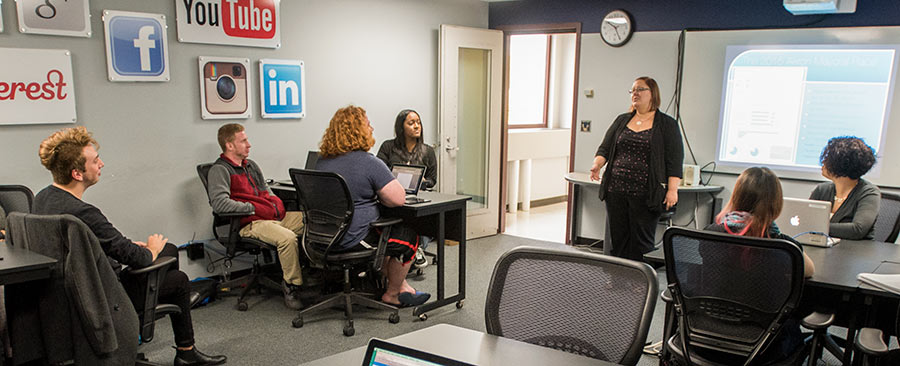 Students participating in a discussion in a social media class at The University of Akron