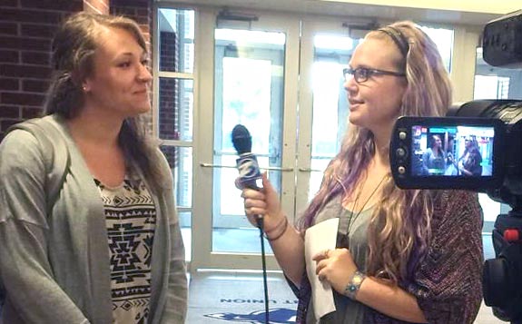 University of Akron PR student being interviewed by a student reporter for student run television program, ZTV.