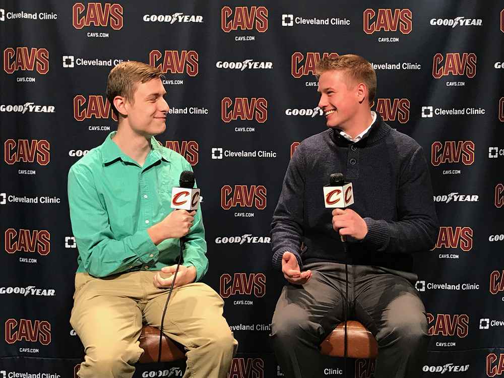 Student working at a cavs press conference