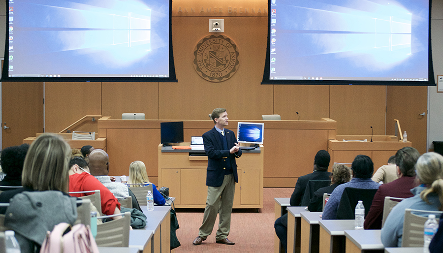 Wilson speaking with potential students