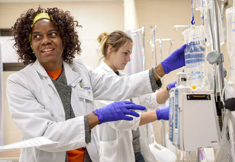 UA nursing student learning in hospital setting while earning a Bachelor's of Nursing degree at The University of Akron.